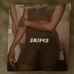 Skims White Sculpting Mid Thigh Shorts